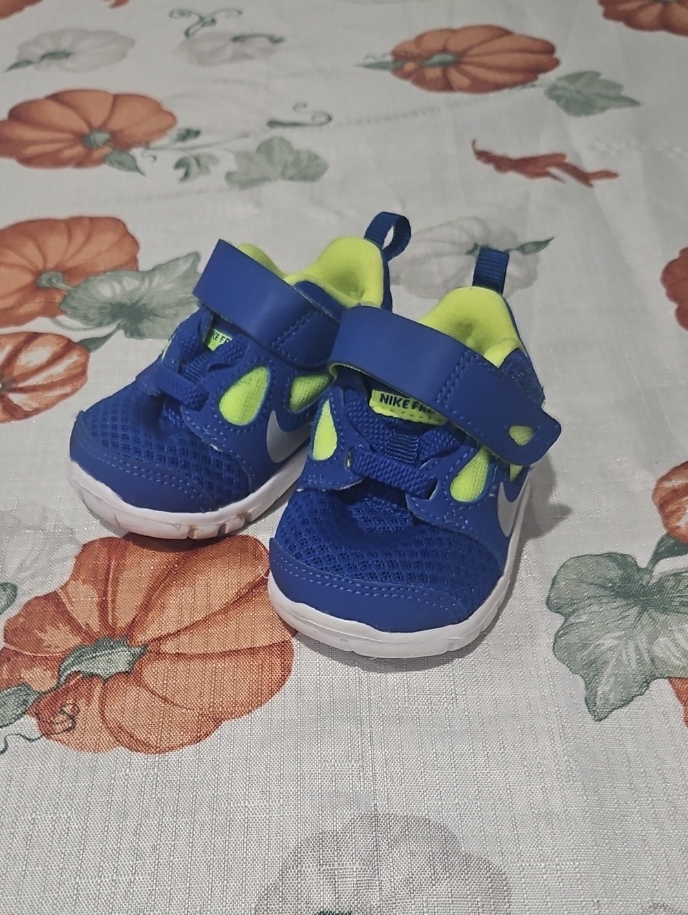 Nike Newborn Blue and Neon Green Athletic Trainers. Size 2c